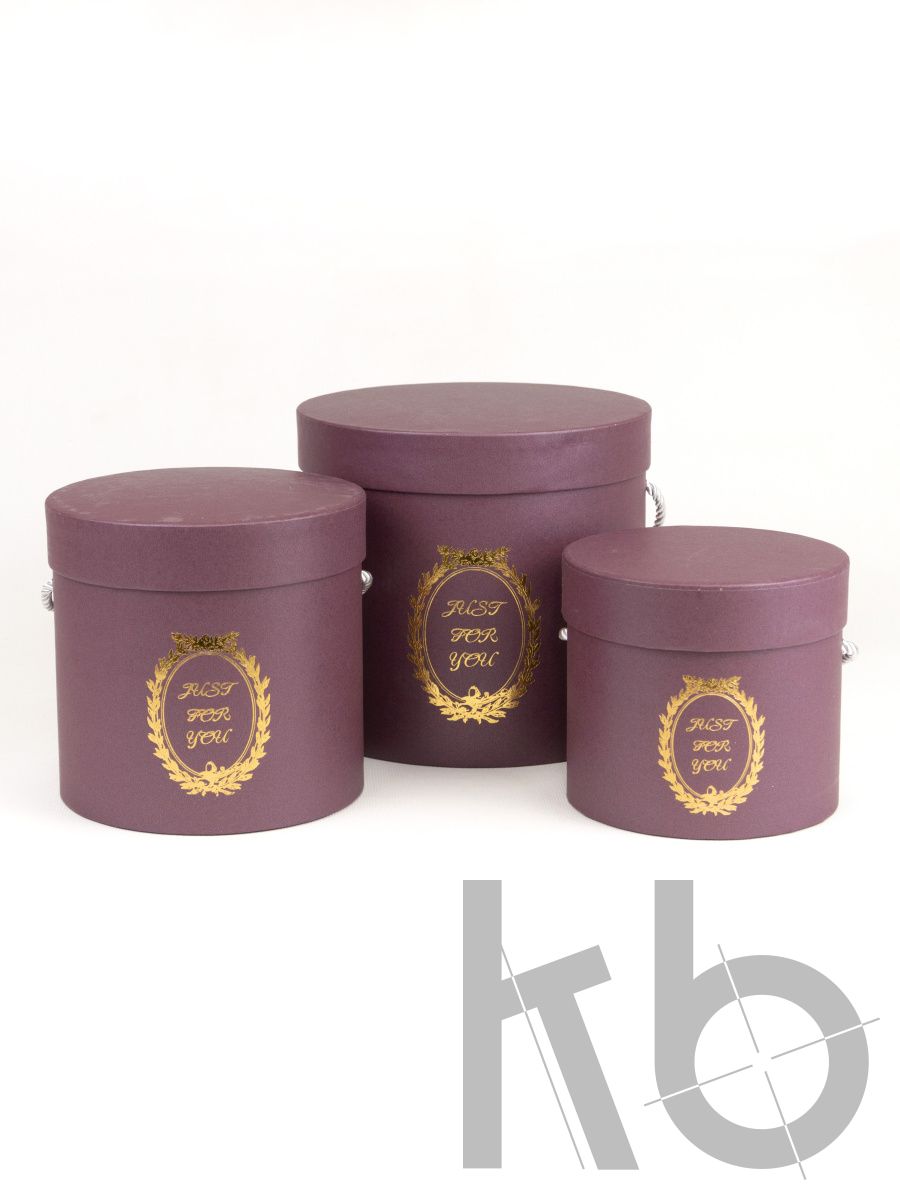 Круглая кашированная бордово-фиолетовая коробка с ручкой